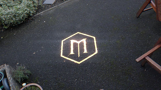 Mock Brief 1. Logo Burn in Ground